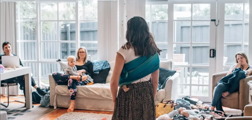 Brooke teaching a baby wearing class